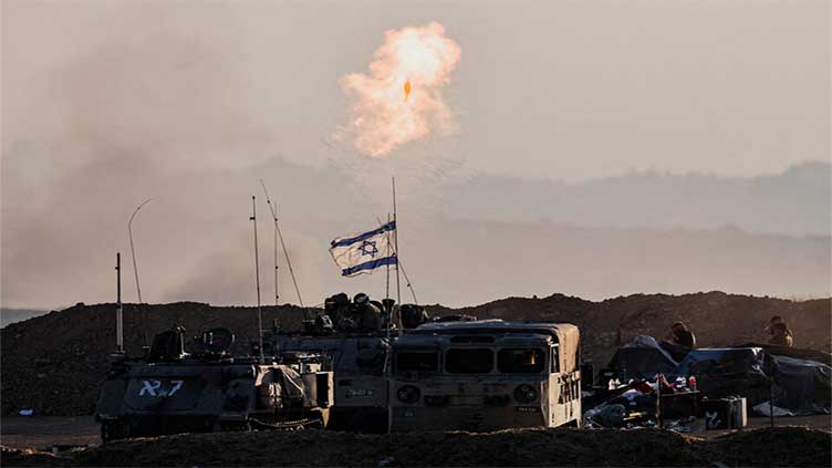 At least 27 Palestinians killed near Gaza aid site, medics say