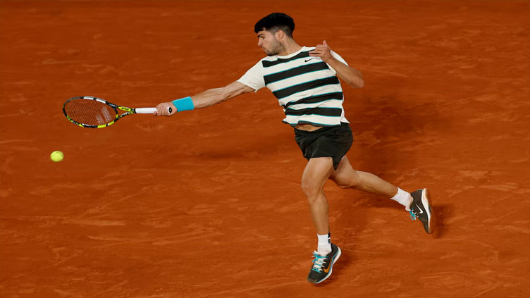 Alcaraz returns to French Open final after ailing Musetti retires