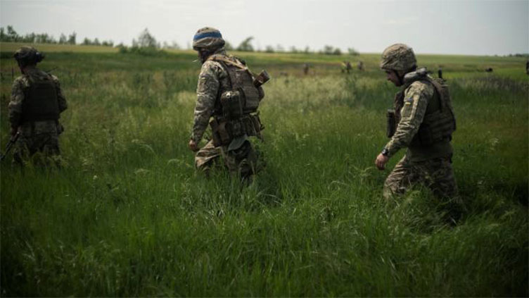 Russia claims key Ukraine advance as peace talks stall