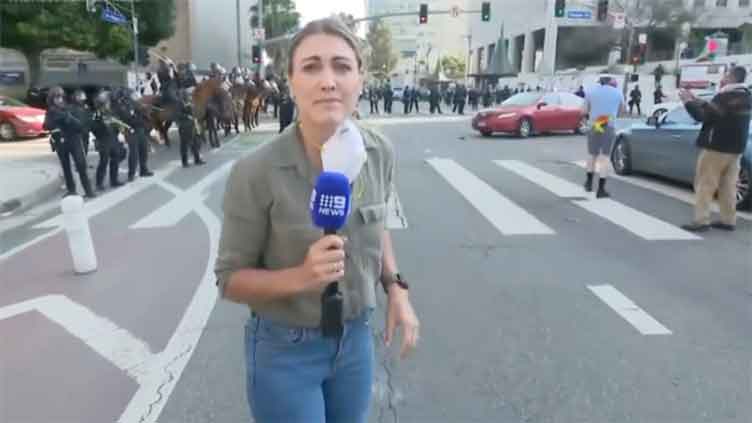 Australian reporter hit by nonlethal round during live report from LA immigration protests