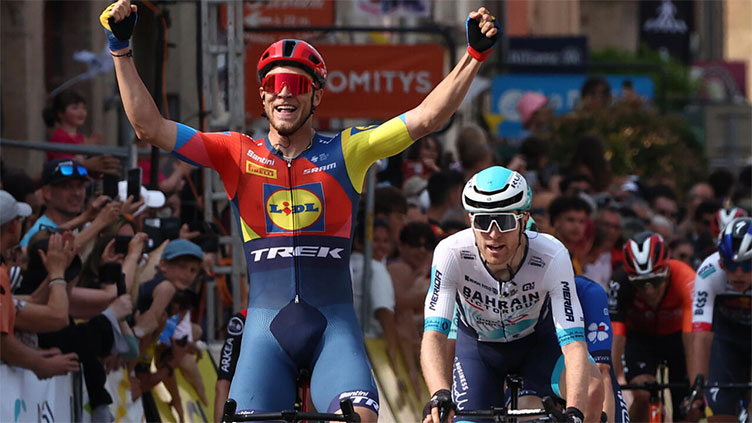 Milan grabs Dauphine stage victory and overall lead