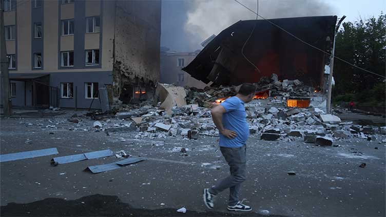 Russian drone and missile attacks kill 2 and wound 13 in Ukraine