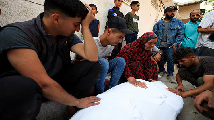 Israeli gunfire kills 17 people near Gaza aid site, health officials say