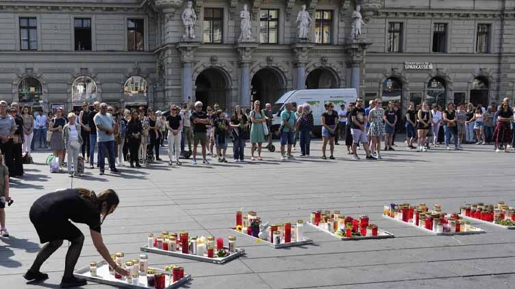 Austria falls silent for a minute as questions remain about the motive for a deadly school shooting