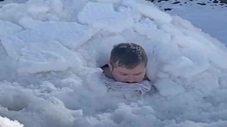 Swiss citizen sets world record by remaining buried in snow for two hours