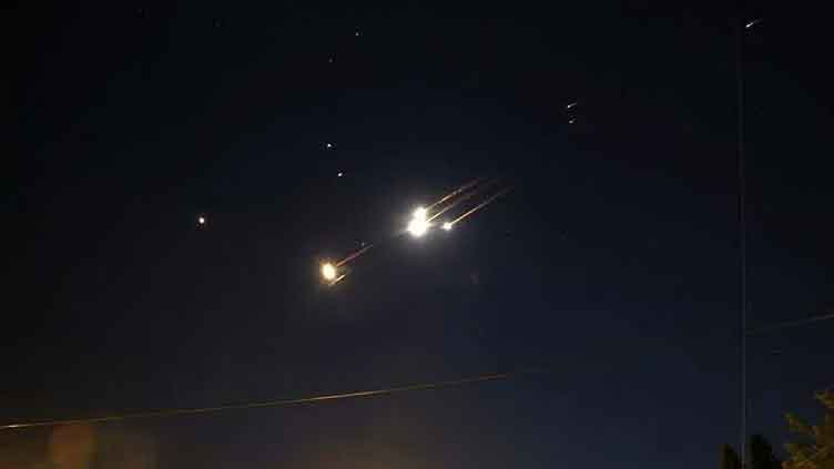 Iran retaliates by firing at least 100 missiles on Israel