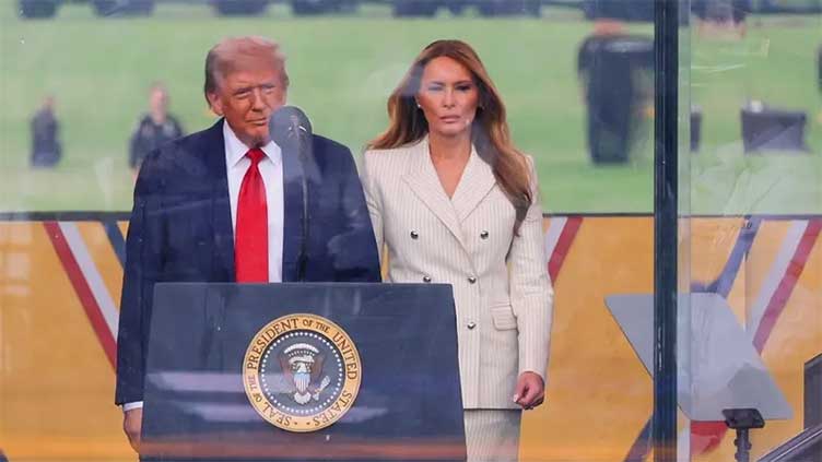 Trump's military parade kicks off as protests sweep US