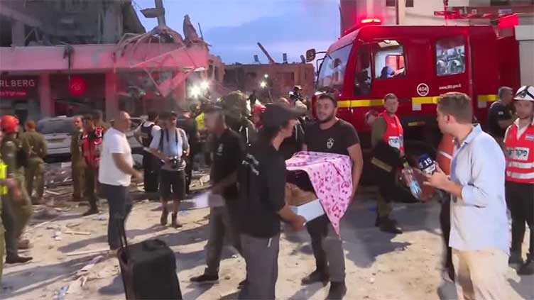 Israeli rescuer says 'dozens' of casualties in coastal town following Iranian missile attack