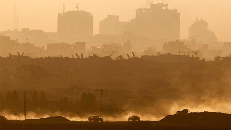 Israeli fire kills 12 people in Gaza, medics say