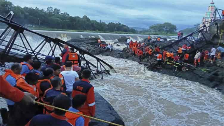 2 killed and 32 injured after a bridge collapses at a tourist destination in western India