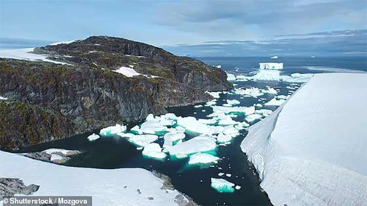 Fisherman baffled after stumbling across huge black iceberg off coast of Canada