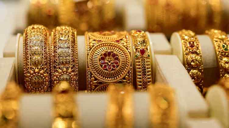 Gold hits near 2-month high as Middle East conflict boosts safe-haven demand