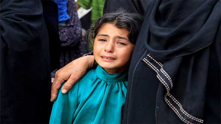 Israeli tank shelling kills 45 people awaiting aid trucks in Gaza, ministry says