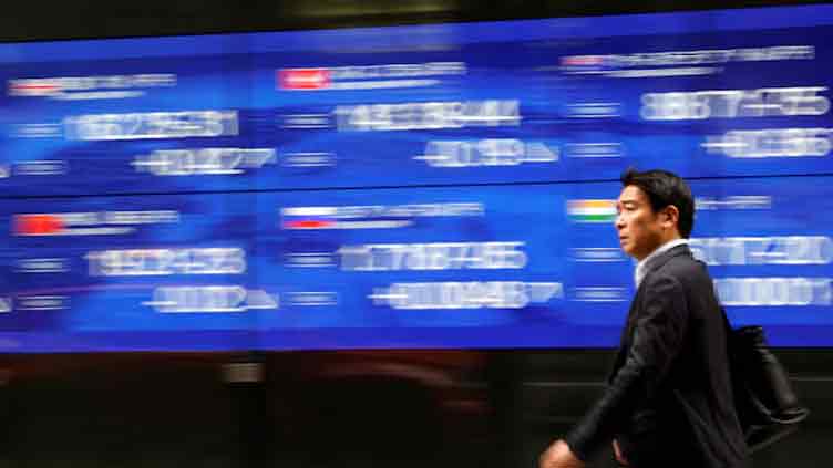 Nervy markets await Fed as Mideast conflict rages on