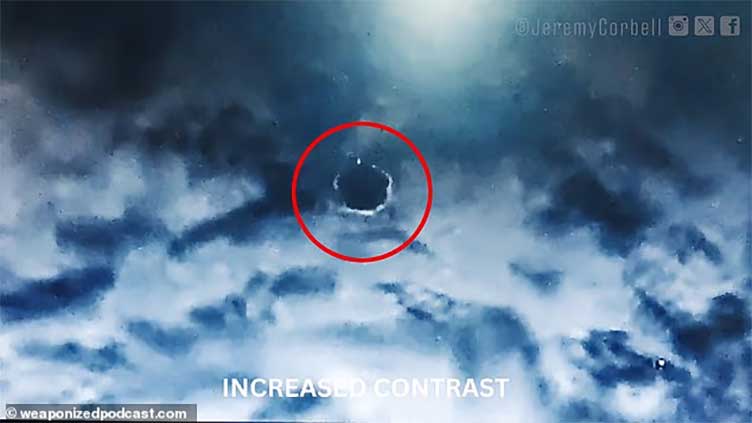 Flying saucer caught on camera by US military in newly-released footage