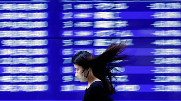 Asian stocks slip as Middle East conflict rages
