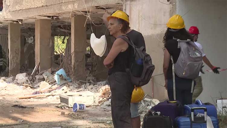 Israelis who lost their homes in Iranian missile strike hope 'war will end'