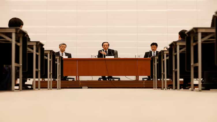 BOJ vows to keep tapering bond buying despite rise in yields