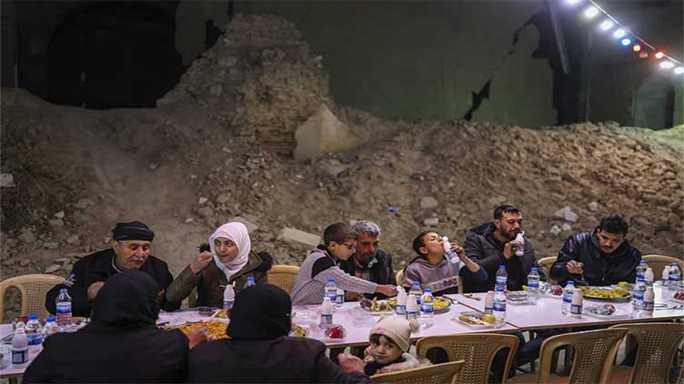 Syrians begin fasting during first Ramadan without Assad family rule in decades