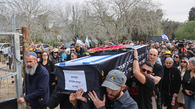 At funeral of slain Gaza hostage, family calls Israel PM 'enemy'