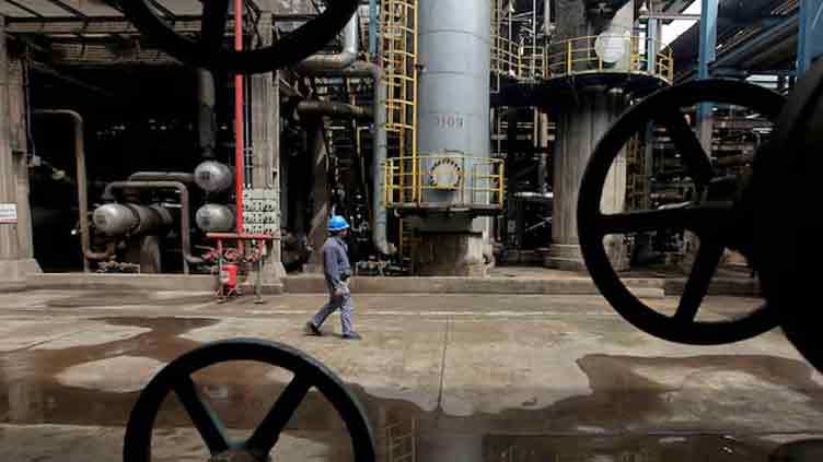 Oil prices slide on Ukraine aid pause, tariffs