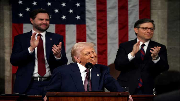 Trump takes victory lap in speech to Congress, Democrats protest