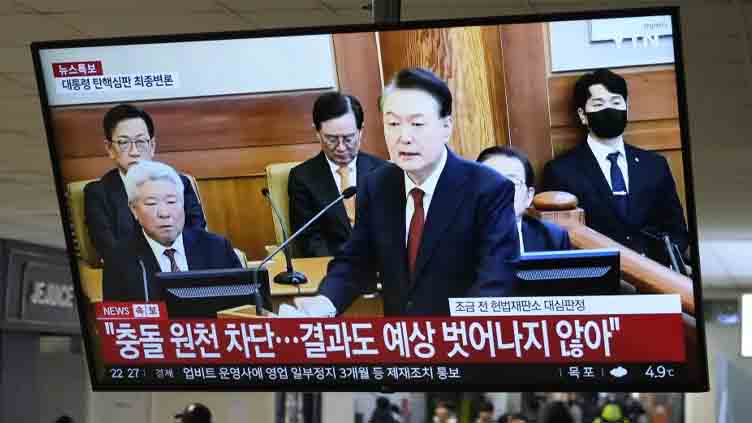 South Korean court orders impeached president released from jail