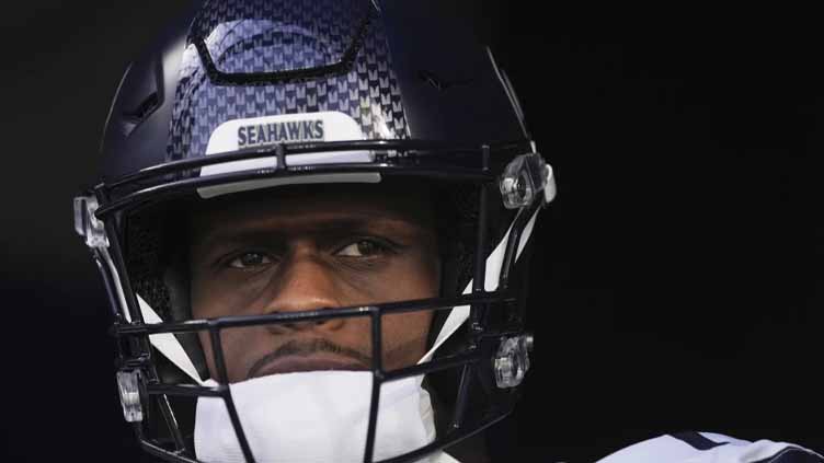 Raiders acquire quarterback Geno Smith from Seahawks for a 3rd-round pick, AP source says