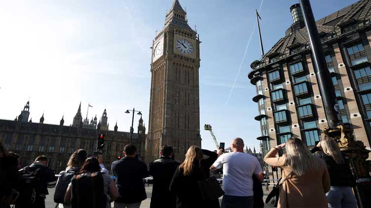 Man climbs London's Big Ben tower waving Palestinian flag