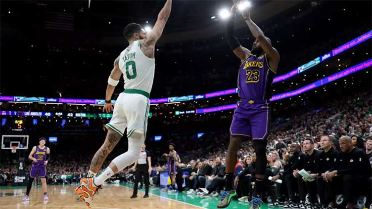 Tatum dominates as Celtics hold off Lakers; James injury scare