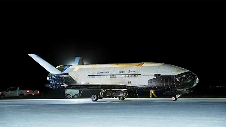 US military's space shuttle returns after secret mission