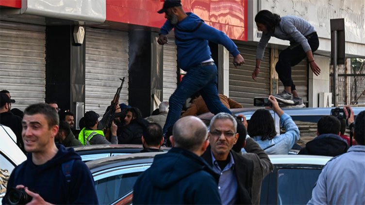 Syria security forces disperse rival protests in Damascus