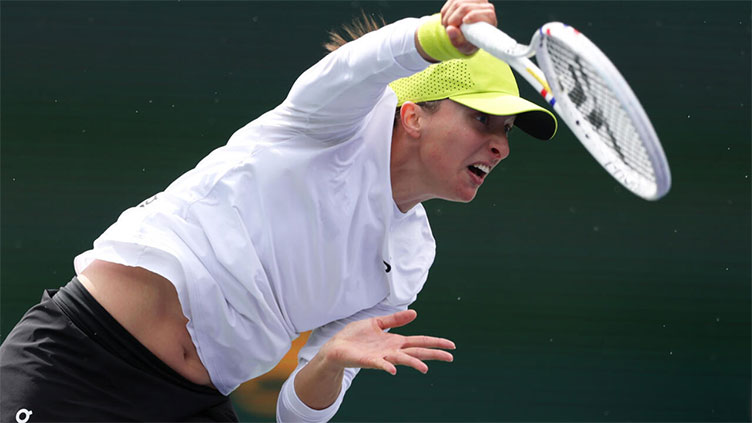 Swiatek surges into quarter-finals at rainy Indian Wells, Rune tops Tsitsipas