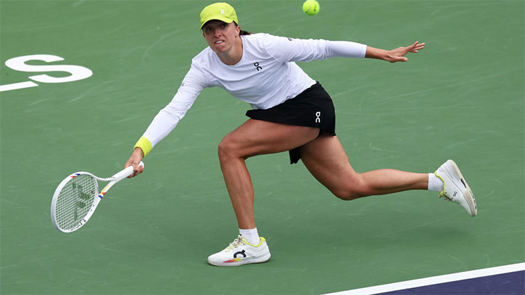 Defending champ Swiatek tops Zheng to reach Indian Wells semi-finals