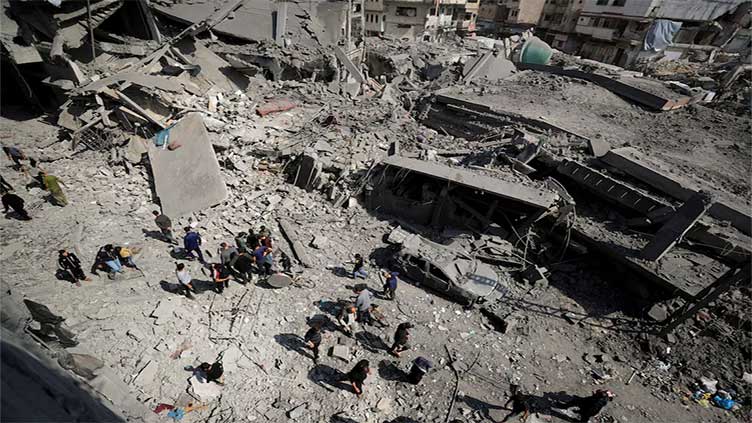 Israeli strikes kill over 400 in Gaza, say Palestinians, threatening total truce collapse