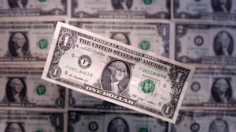 Dollar wobbles as Fed soothes market nerves with rate cut projection