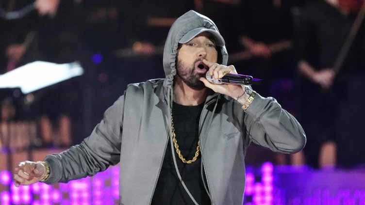 A former studio engineer is charged with stealing unreleased Eminem music and selling it online