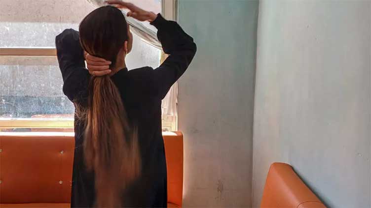 Dunya News Afghan women risk Taliban wrath over hair trade