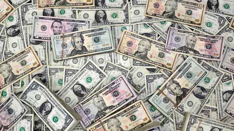Dollar poised for third weekly gain on trade optimism; Aussie climbs