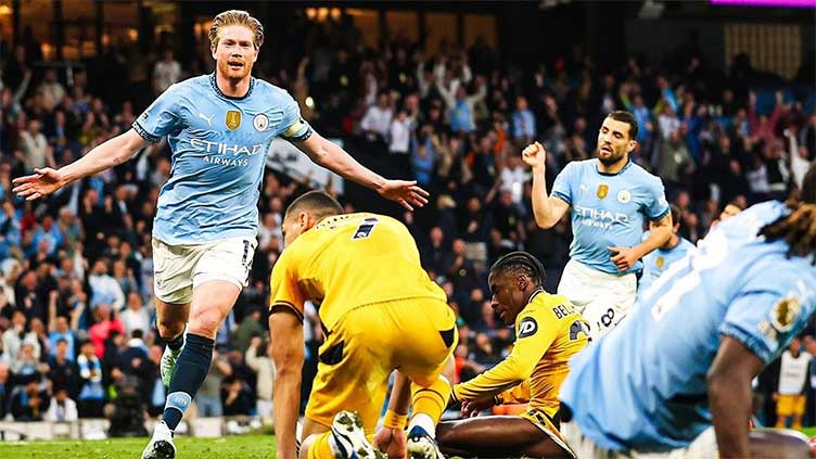 Man City climb to third as De Bruyne sinks Wolves