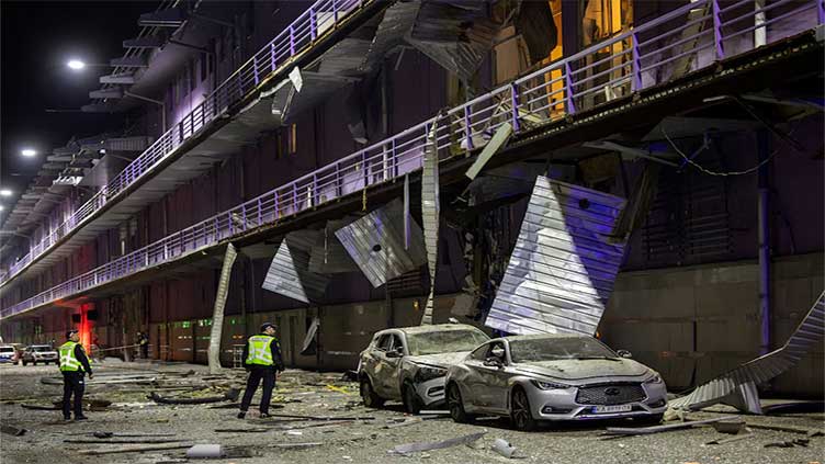 Russia's drone attack on Kyiv sets several residential buildings on fire, Ukraine says
