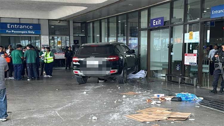 Four-year-old girl among two dead in Manila airport car crash, says Red Cross