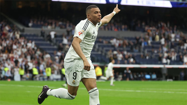 Mbappe maintains Real Madrid Liga dream in Celta thriller