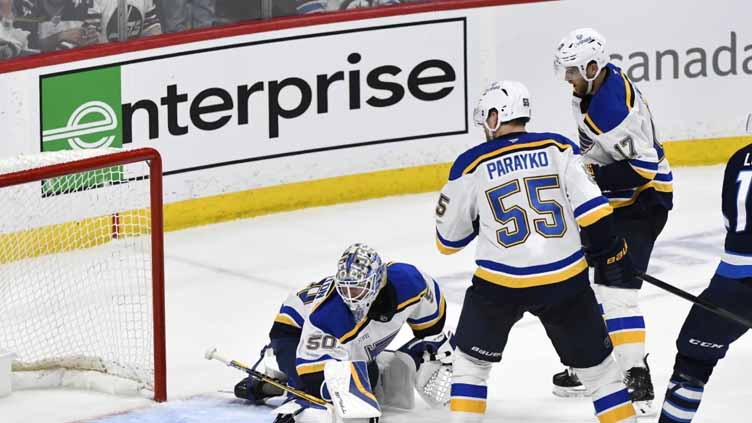 Lowry scores late in 2OT to rally Jets to 4-3 win over Blues in Game 7 to advance to 2nd round