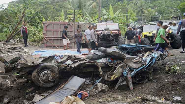 A dump truck crashes into a minibus in Indonesia, killing 11 kindergarten teachers