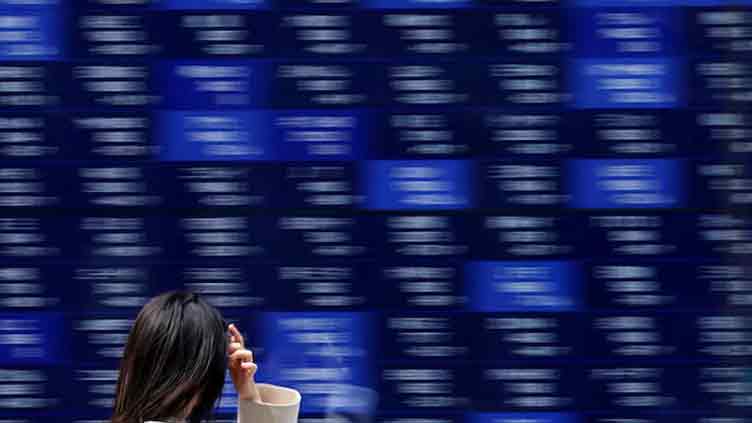 Shares firm on hopes for trade deals