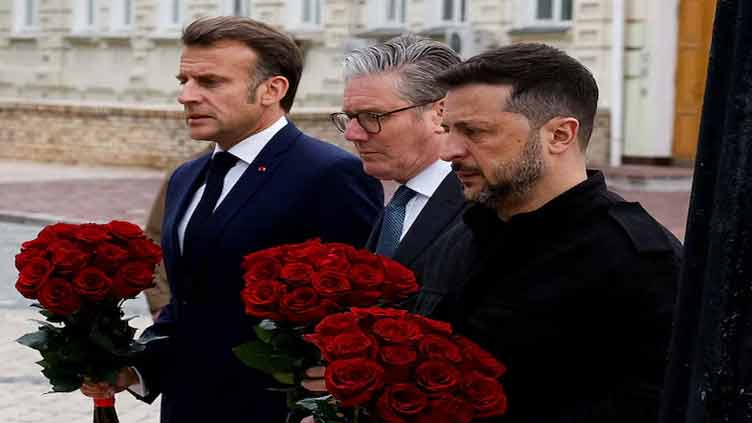 France in talks with Britain, Ukraine about potential troops, Macron tells paper