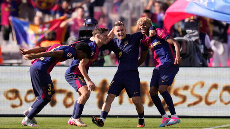 Barca edge Real Madrid in thriller to move to brink of Liga title