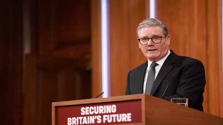What are British PM Starmer's new policies to curb net migration?