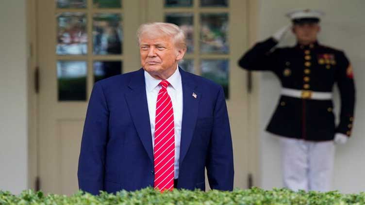 Trump says he may ease sanctions on Syria